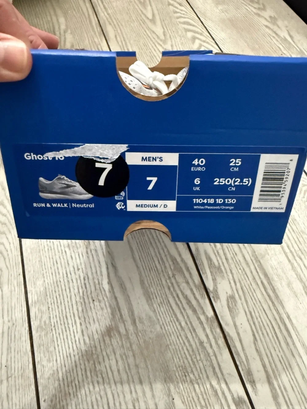 Brooks White and Navy Running Shoes with Orange Logo Accents